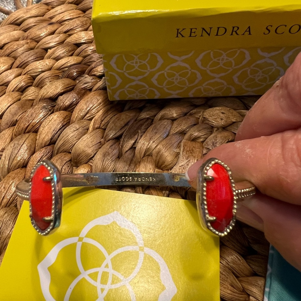Kendra Scott gold bracelet with red stone/gem